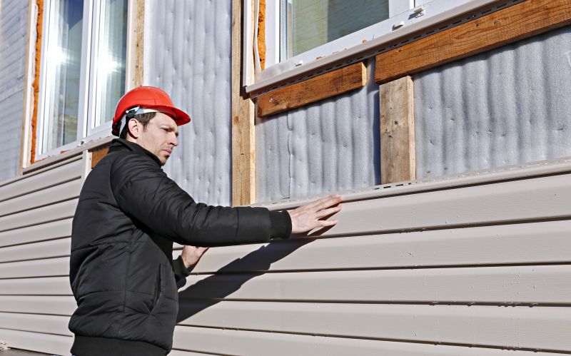 Skilled Siding Contractors at Work